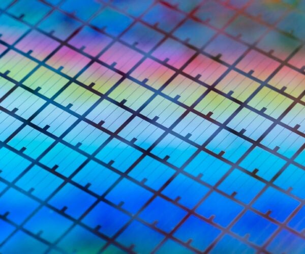 Silicon,Wafer,With,Microchips,Used,In,Electronics,For,The,Fabrication
